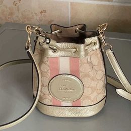 Designer womens handbag New Dempsey Mini Drawstring Bucket Bag Fragrant Blae One Shoulder Crossbody Handheld Old Flower Wanderer