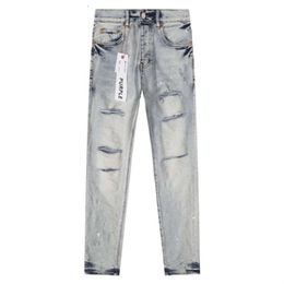 Pantaloni per le gambe dritti di jeans per uomini in difficoltà violate in difficoltà