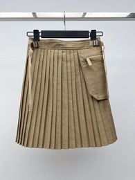 Skirts The Pleated Skirt Has A Flared Cut With Oversized Side Pockets And One-tone Slip-on Belt