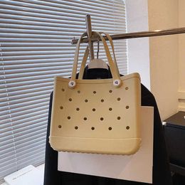 Designer womens handbag New Super Hot Popular Beach Shopping Basket Hole Big Bag Handbag