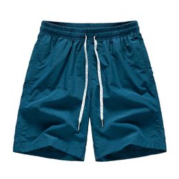 Mens Quick Dry Breathable Split Sport Casual Shorts Mens Solid Loose Large Beach Pants