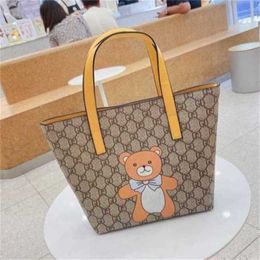 2024 New Designer womens crossbody shoulder can be and mixed batches Korean old flower cartoon shopping portable Bento large Mommy bag