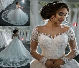 New Dubai Elegant Long Sleeves Aline Wedding Dresses Sheer Crew Neck Lace Appliques Beaded Vestios De Novia Bridal Gowns with But1536224
