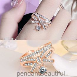 Korean Bow Ring Female Minority design fashion drop shaped opening rose gold light luxury net red index finger ring