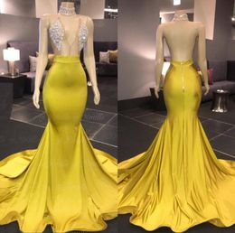 Yellow Gold Prom Dresses Sexy V Neck Sleeveless Mermaid Halter Open Back Sweep Train Formal African Evening Dress2582349