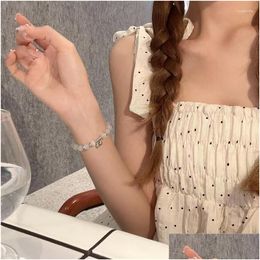 Charm Bracelets Limax Opal Bell Bracelet Womens Niche Design High-End Sense Hand Accessories Simple Light Luxury Style Versatile Drop Dhtwf