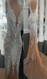 Luxurious Crystal Beaded Mermaid Prom Gown Sexy Sleeveless VNeck Champagne Tulle Lining Formal Evening Dresses Backless Sweep Tra6730392