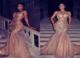 Sparkling Gold Crystal Mermaid Prom Dresses 2018 Myriam Fares See Through Champagne Sequined Backless Evening Gowns Party Pageant 4731572