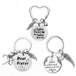 Keychains Lanyards Best sisters key chain Stainless steel friendship ring Jewellery is not blood but heart birthday gift Q240403