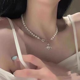 Designer Western Kaiserin Dowageres Planet Halskettenschichten aus Perlen Volldiamant Saturn -Kragenkette für Frauen Edelstahl Designer Schmuckarmband