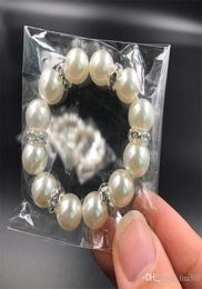 300PcsLot White Pearls Napkin Rings Wedding Napkin Buckle For Wedding Reception Party Table Decorations Supplies I1218477475