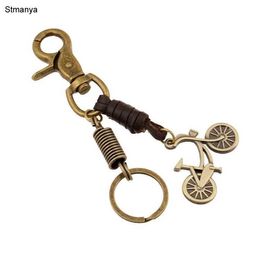 Keychains Lanyards Bicycle Leather Key Chain - New Fashion Retro MinI Bike mens leather key chain hand knit Ring For Lovers Day gift 17372 Q240403