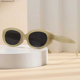 Sunglasses New Trend Sunglasses Womens Oval Rice Nail Design Retro Leisure Fashion Travel Sunglasses Womens UV400L2404