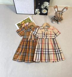 INS Girls plaid dresses England Style kids Bow tie lapel short sleeve pleated dress 2024 summer children cotton lattice clothes S1307