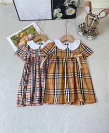 INS Girls plaid dresses kids Bow lapel short sleeve pleated dress 2024 summer children cotton lattice clothes S1306