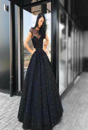 2020 New Black Evening Gowns Sheer Sweetheart Neck Short Sleeves Tulle Floor Length Pearls A Line Vestido Party Prom Dresses8996765