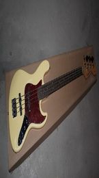 2014 Creamy yellow guitar jazz bass four string electric bass four strings guitar Active pickups 9V battery3868432