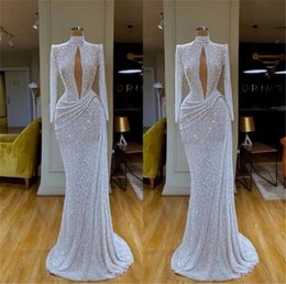 Gorgeous Silver Sequins Mermaid Evening Dresses Sexy Keyhole High Collar Long Sleeve Pleats Long Occasion Party Gowns Prom Wears B9384746