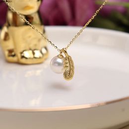S925 Pure Silver Plated 18k Gold Feather Pearl Necklace Fashionable and Simple Couple Sweater Chain Jewelry