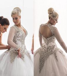 Modest Long Sleeves Wedding Dresses Rhinestones Crystals Plunging Beaded Bridal Dress Backless Sheer Ball Gown Plus Size Wedding G1489924