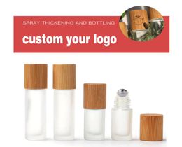 5 10 15ml Frosted clear Roll On Glass Bottle with Bamboo Cap 12 oz Roller Ball Perfume Essential Oil Bottles custom logo6741491