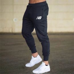 Mens spring summer slimfit highquality jogging pants Thin fast drying breathable fitness fashion running casual 240407