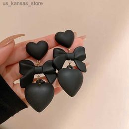 Charm Heart shaped black bow womens design high-end pendant earrings elegant new fashion solid color charm jewelry240408
