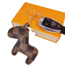 Fashion designer keychain neutral classic luxury keychain handcrafted leather doll car keychain with exquisite gift box