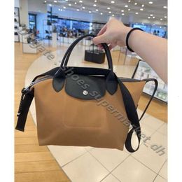 Retail Wholesale 95% Off hobo bag Nylon 1512 Small luxury Dumpling Womens High Fabric with Cowhide Casual Crossbody Youth Quality Shoulder Handbag