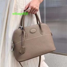 Bolide Leather Handbag Trusted Luxury Womens Bags Togo Cowhide Shell Bag 2024 New Versatile Bowling Handheld Womens Bag Solid Simple One Shou have logo HBWBNJ