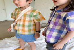 INS Children plaid shirt boys lapel single breasted short sleeve shirt girls lattice casual tops kids cotton clothing A86609189139