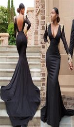 Sexy Black Evening Dresses Sexy Backless Deep V Neck Mermaid Long Formal Prom Gowns Gold Lace Applique Long Sleeves African Gowns 4653627