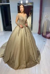 Arabic Aso Ebi Gold Lace Beaded Wedding Dresses Sheer Neck Bridal Dresses Long Sleeves Satin Plus Size Wedding Gowns8664238