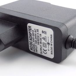 AC DC 9V 1A 1000ma Power adapter supply EU plug reverse polarity charger adaptor AC 100V-240V Converter Negative Inside switch