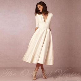 Vintage Wedding Gowns 1950039s Tea Length Short Wedding Dresses with Sleeves Sexy Deep V Neck Ivory Summer Beach Bridal Gown8846501