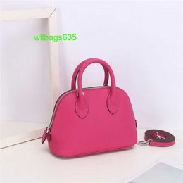 Bolide Leather Handbag Trusted Luxury Womens Bags 2024 New 18cm Shell Wrap Head Layer Cowhide Litchi Pattern Mini Bowling Ball Handheld Genui have logo HBOMU5