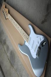 Electric guitar with big silver factory in pearl white and pickguard microphones channel region providing Customised services4326505