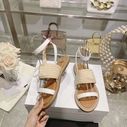 New Spring/summer Triumphal Arch High Appearance Grass Knitted Sandals Letter Simplified Open Toe Buckle Flat Bottom Slippers for Women