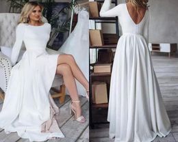 Simple A Line Wedding Gowns Jewel Neck Long Sleeves Boho Garden Bridal Dresses Sexy Backless Floor Length Beach Modern Robes de Ma1777195