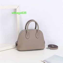 Bolide Leather Handbag Trusted Luxury Womens Bags 2024 New 18cm Shell Wrap Head Layer Cowhide Litchi Pattern Mini Bowling Ball Handheld Genui have logo HB7G7C