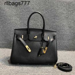 Designer Leather Handbag Bk the Mall Removed Goods From Cabinet. Lear Womens Bag Is First Layer Made of