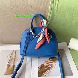 Bolide Leather Handbag Trusted Luxury Women's Bags 2024 New Mini Bowling Bag New Top Layer Togo Litchi Pattern Cowhide Shell Bag have logo HBZREH