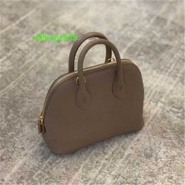 Bolide Leather Handbag Trusted Luxury Womens Bags 2024 New Goat Pattern Head Layer Mini Bowling Bag Simple Shell Bag One Shoulder Crossbody Ba have logo HBPY55