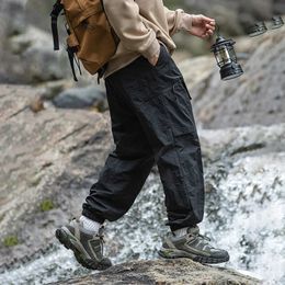 TFETTERS Autumn Men Cargo Pants Multi Pocket Waterproof Solid Color Casual Pants 100% Nylon Outdoors Tourism Men Clothes 240326