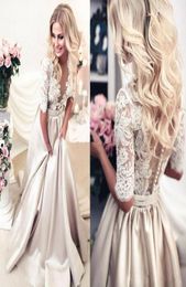 Romantic Sexy V Neck Transparent Half Sleeve A Line Wedding Dress with Pockets Lace Satin Champagne Bridal Gown 2019 Custom Made A6392120