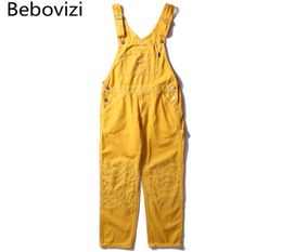 Bebovizi Fashion Hip Hop Male Suspenders Jeans Casual Denim Overalls Streetwear Men039s Bib Jeans Yellow Boyfriend Jumpsuit250s9490461