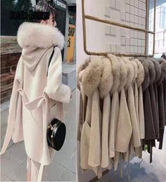 Korean Version Long Cashmere Coat With Real Fox Fur Trim Hoodie Warm Thicken Large Pockets Coat female Women Outwear Winter Coat C2441515