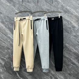 Highend brand mens pants fashion belt stitching design pencil pants high quality luxury top designer pants