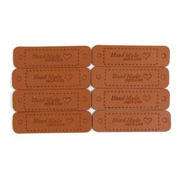 50Pcs 56x15mm Handmade Label Hand Made With Love Leather Tags PU Garment Label For Clothes Tags On The Hat DIY Crafts