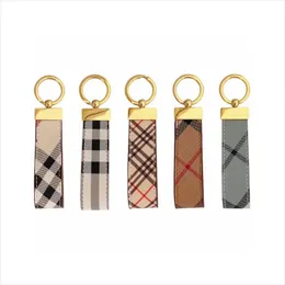 Dragonne Designer Keychain Luxury masculino keyring ouro banhado fivela lançal carta -chave Chain Men masculino portachiavi carm carm de couro clássico Keychains Designer